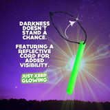 Reusable Reflective Cord Glow Stick - 'Darkness Doesn't Stand A Chance' - Just Keep Glowing. Bright green reusable glow stick with reflective cord for added visibility. Emergency light source for hiking, camping, and outdoor safety. Reliable illumination in low-light conditions. Essential gear for adventurers. Long-lasting glow, no batteries needed. Reflective cord enhances visibility at night.
