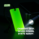 Forever Glow Bar charging under flashlight – reusable glow stick alternative that charges fast and glows for hours