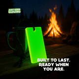 Forever Glow Bar on camp table – durable handmade reusable glow in the dark stick for camping and survival kits