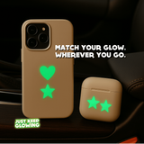 Matching glow in the dark stickers on phone case and AirPods case for coordinated accessories.