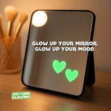 Glow in the dark heart stickers on a vanity mirror for aesthetic room and makeup decor.