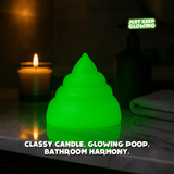 Glow in the dark poop on bathroom counter next to candle, funny gag gift and rechargeable decor light.