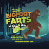 Bigfoot Farts funny label graphic, novelty gag gift artwork showing Bigfoot in forest, Just Keep Glowing.