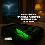Glow stick on suitcase inside cruise cabin – cruise emergency travel light kit.