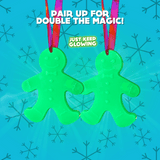 Two glowing green gingerbread ornaments shown together, featuring a double pack set for twice the holiday magic and decorating fun.