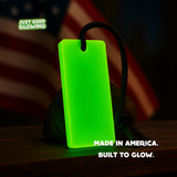 Made in USA Forever Glow Bar, a reusable glow in the dark light for camping and emergency preparedness, displayed with an American flag.