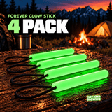 Four green reusable Forever Glow Sticks with black paracord loops arranged on a wooden camping table at sunset, showing the four pack option.