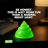 Funny glow in the dark poop night light on bedside table, reusable novelty light for kids and teens.