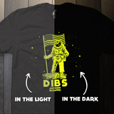 Glow in the dark astronaut shirt showing bright glow after charging with light and in full darkness.
