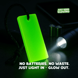Glow bar being charged by flashlight – rechargeable no-battery glow light.
