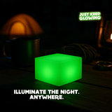 Glow Cube XL lighting a camping table at night, glow-in-the-dark light for camping gear and survival use.
