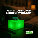 Glow Cube XL flipped over to show hidden storage cavity, two-in-one glowing cube night light and storage tray.