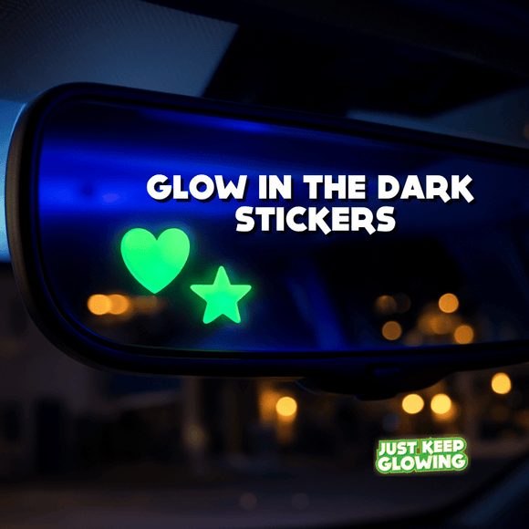 Glow in the dark heart and star stickers on a car mirror, cute car accessories for women.