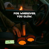 Man relaxing in truck with stainless steel tumbler and glow in the dark orange car coasters lighting up cup holders – rugged camping vibe by Just Keep Glowing™.