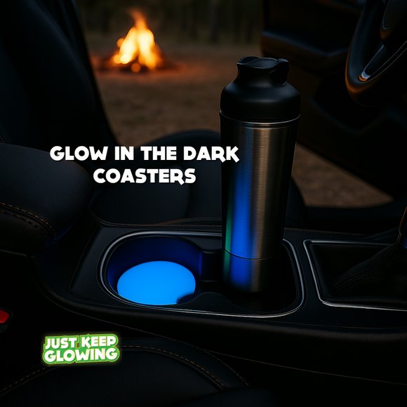Set of 2 glow in the dark car cup holder coasters glowing blue in truck interior with campfire in background, luxury handmade resin coasters for cars, SUVs, and outdoor adventures.