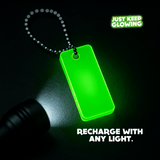 Glow-in-the-dark keychain included with unicorn farts jar – reusable, charges with any light.