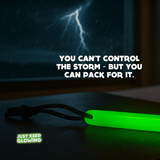 Rechargeable glow stick on table with lightning storm outside – emergency travel blackout light.