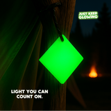 Glow Tile hanging on tent during camping trip – reusable glow stick for outdoor safety lighting