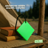Glow Tile daylight view showing bright green tile charging in sun – reusable eco glow stick