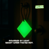 Reusable Glow Tile charging by ambient light – dependable emergency glow light for home or travel