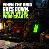 Green Forever Glow Tag with stainless steel cable loop attached to an emergency backpack beside a flashlight, first aid supplies, and radio, illustrating gear identification during power outages.