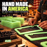 Hands finishing green glow in the dark license plate frames in an American workshop, representing the small family business behind Just Keep Glowing.