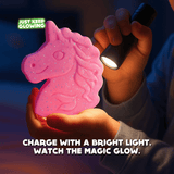 Child charging unicorn glow toy with flashlight — reusable no-battery night light that charges in seconds