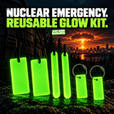Nuclear Emergency Glow Kit featuring two reusable green glow bars, two glow sticks, and two glow tags beside a survival backpack, with a fictional nuclear explosion in the distance.
