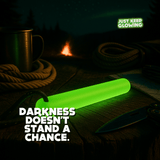 Glow stick illuminating a campsite table near a campfire. Darkness doesn't stand a chance.