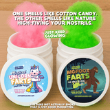 Open unicorn and Bigfoot fart jars showing scented fluff – cotton candy vs nature smell joke gift.