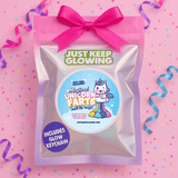Magical Unicorn Farts in holographic pink gift bag – handmade USA joke gift with glow keychain.